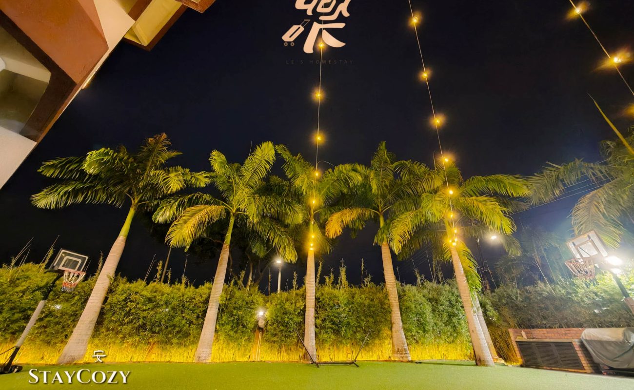 Beautiful garden night view with string lights at Le's Homestay Lot 550, a scenic Homestay Melaka Private Pool venue.