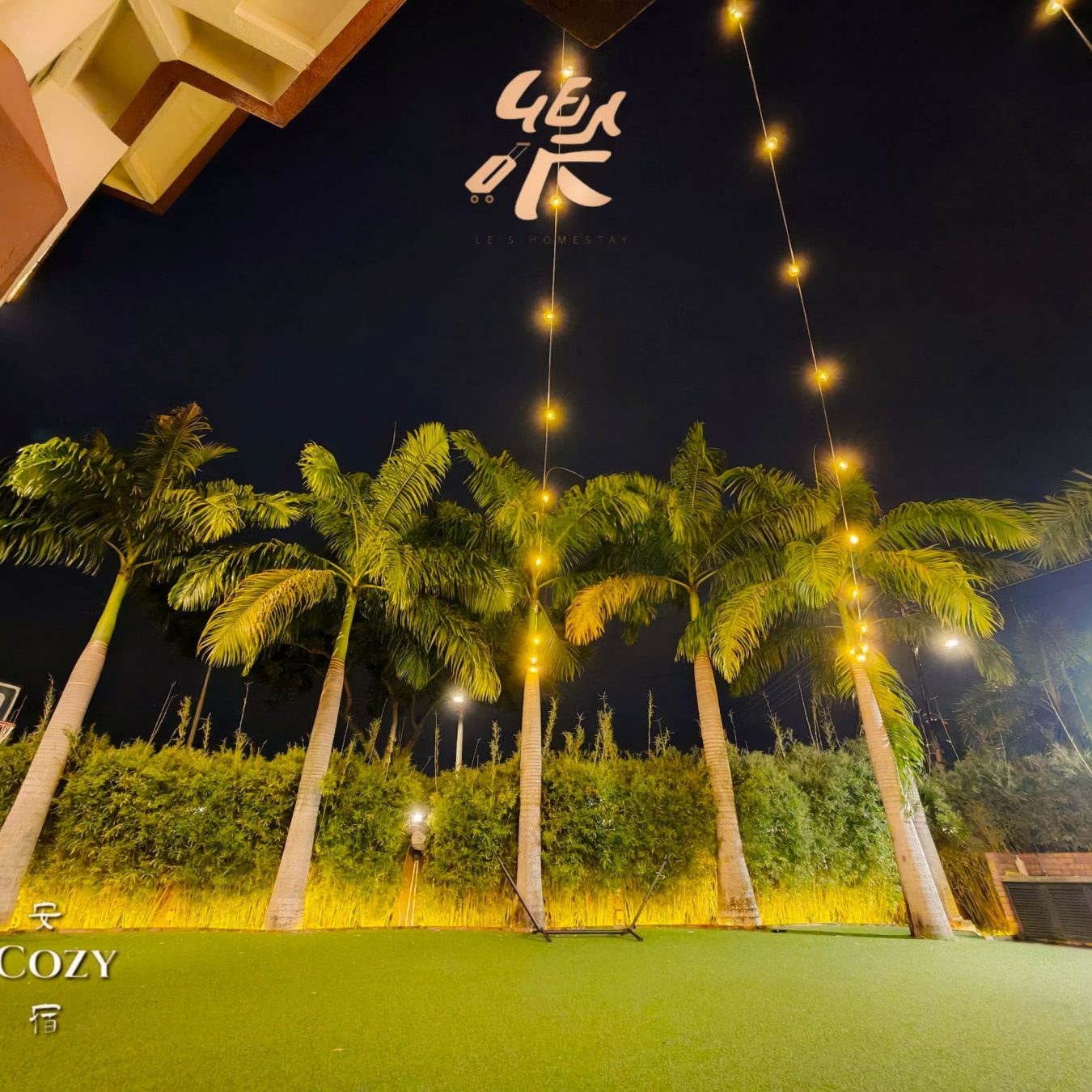 Beautiful garden night view with string lights at Le's Homestay Lot 550, a scenic Homestay Melaka Private Pool venue.