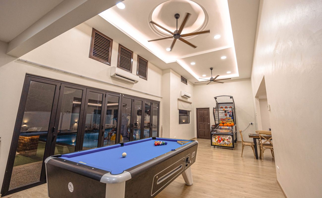 Indoor pool table entertainment facility showing high ceiling design at Le's Homestay Lot 916 A'Famosa Homestay