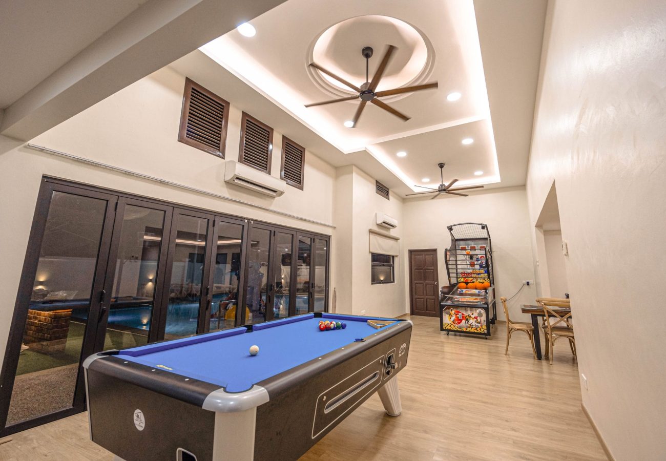Indoor pool table entertainment facility showing high ceiling design at Le's Homestay Lot 916 A'Famosa Homestay