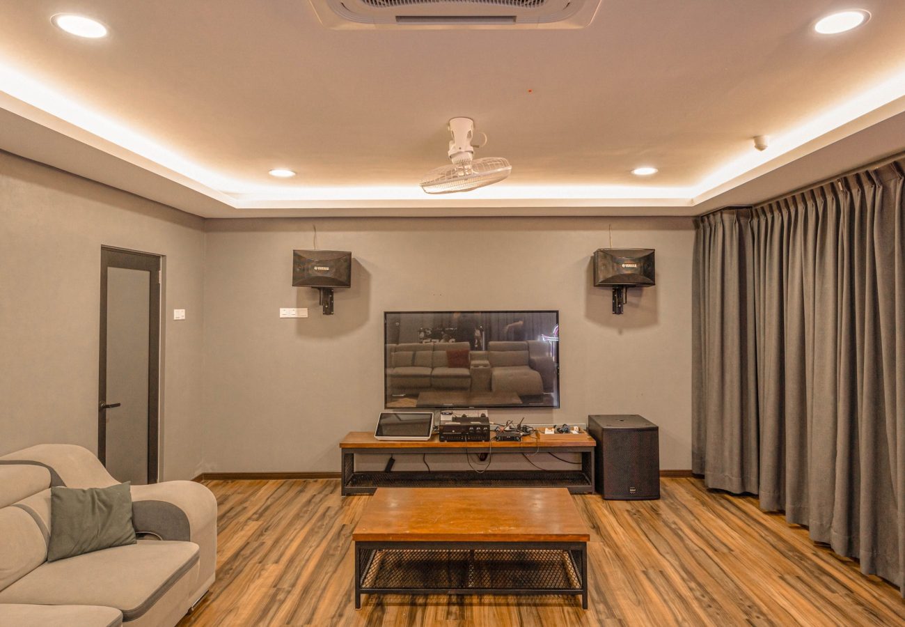 Spacious living room equipped with professional Karaoke KTV system at Le's Homestay Lot 916 A'Famosa Homestay