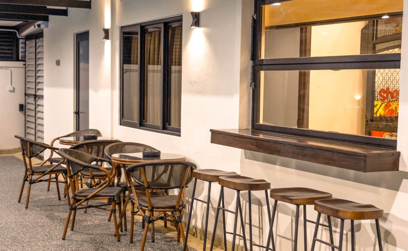 Outdoor patio bar seating area for relaxing gatherings at Le's Homestay Lot 916 A'Famosa Homestay
