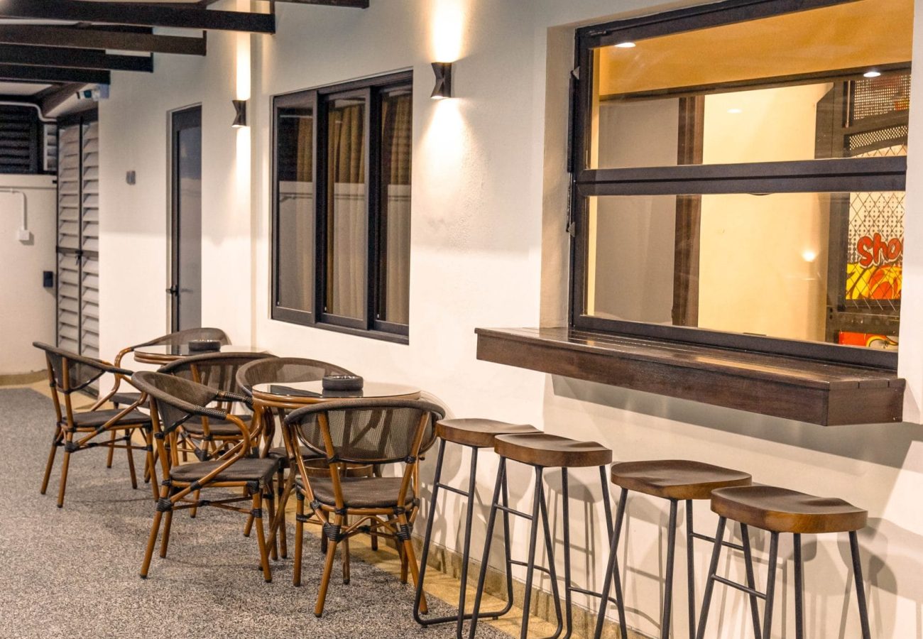 Outdoor patio bar seating area for relaxing gatherings at Le's Homestay Lot 916 A'Famosa Homestay