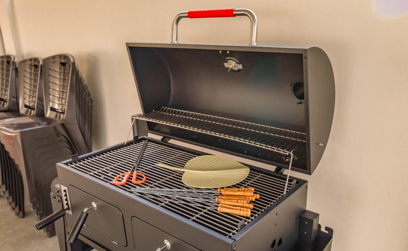 Large outdoor BBQ pit and grilling equipment provided at Le's Homestay A'Famosa Homestay