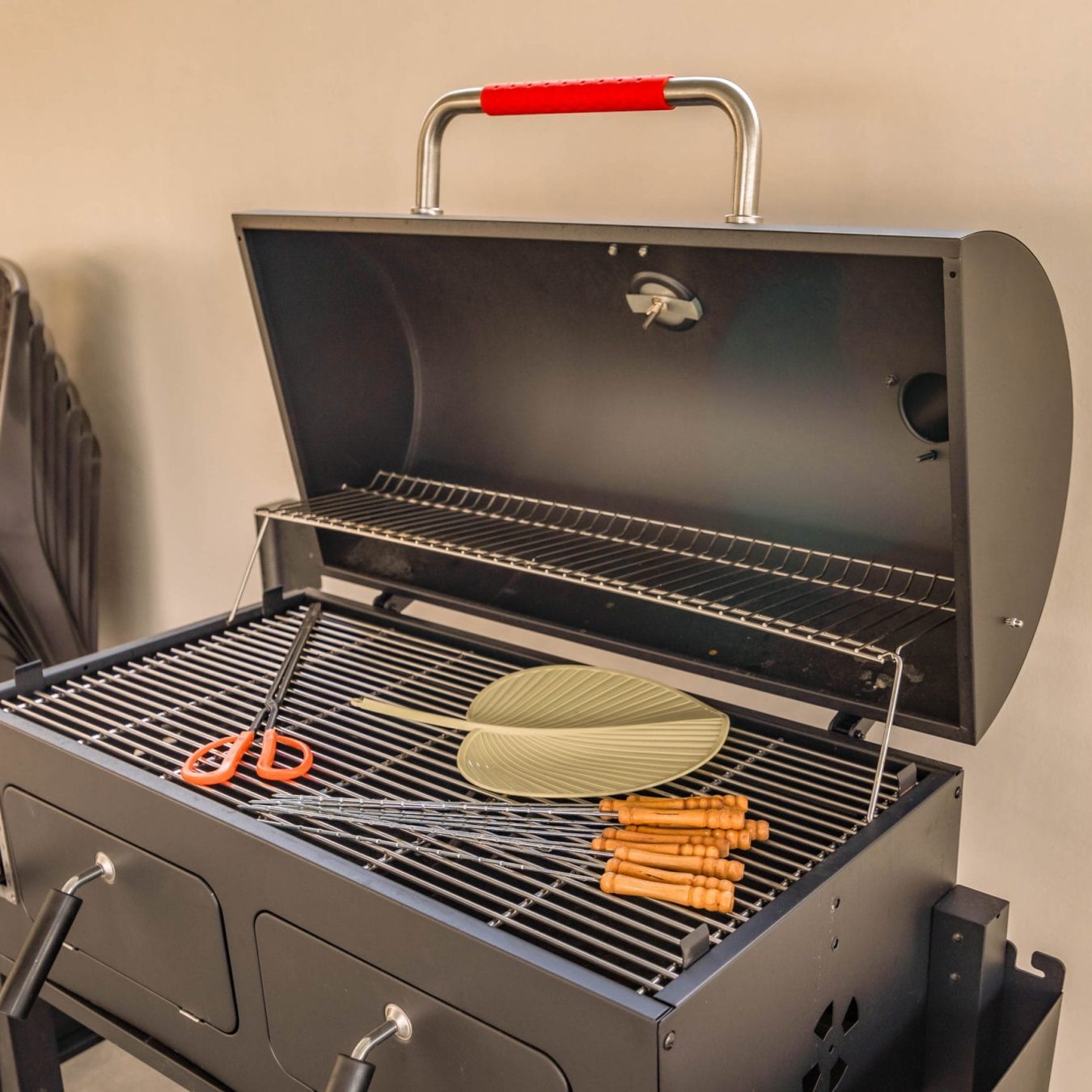 Large outdoor BBQ pit and grilling equipment provided at Le's Homestay A'Famosa Homestay