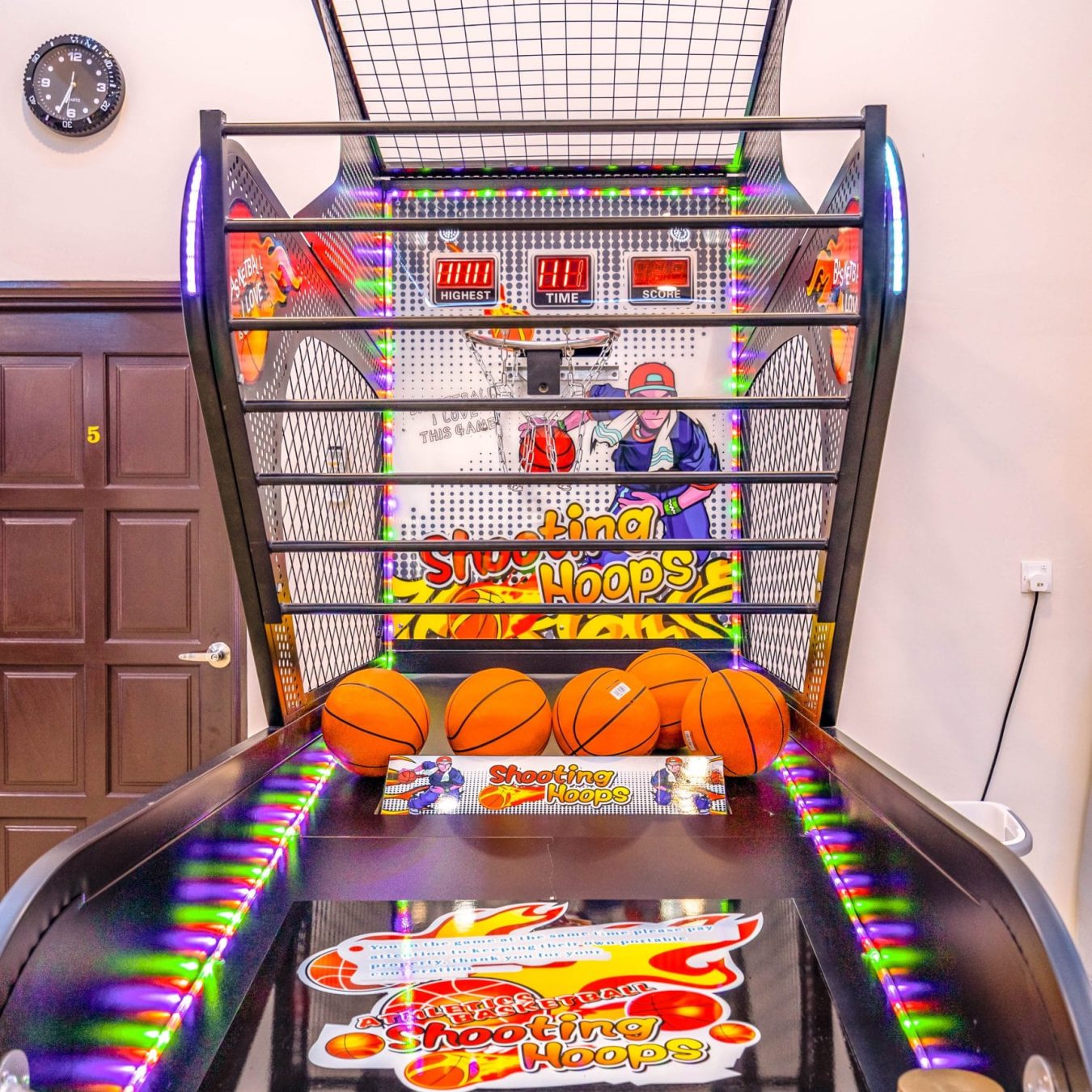 Electronic basketball shooting game facility for family fun at Le's Homestay