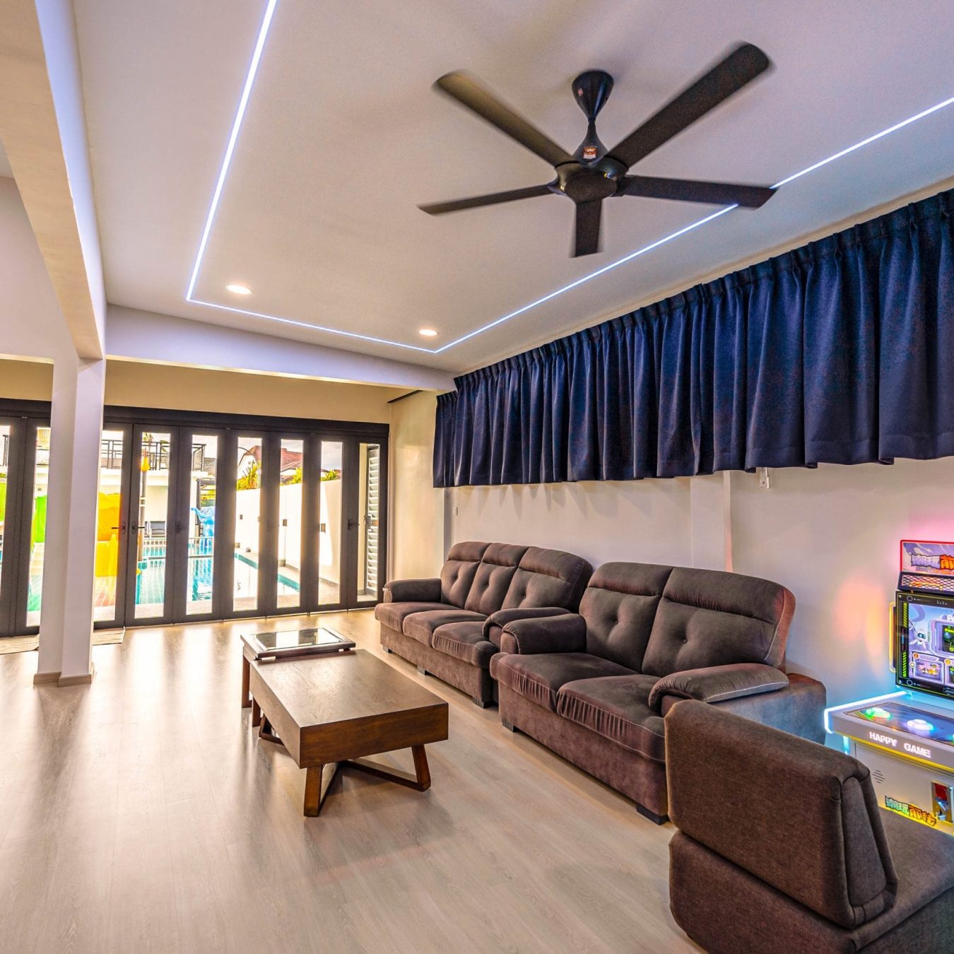 Modern interior living area with comfortable sofa set at Le's Homestay