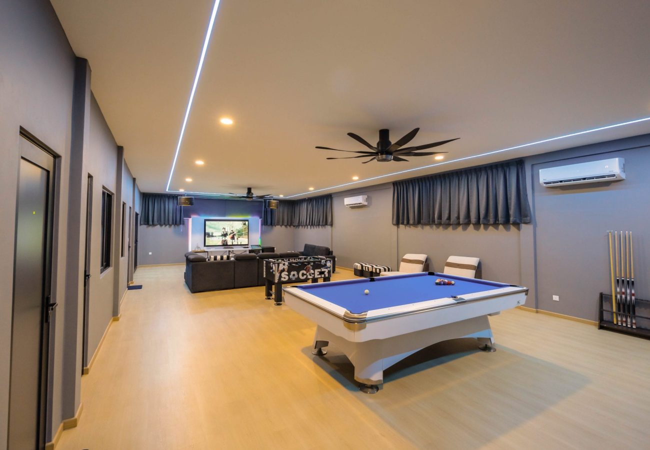 Spacious entertainment hall with pool table and karaoke KTV system at Le's Homestay A'Famosa Homestay