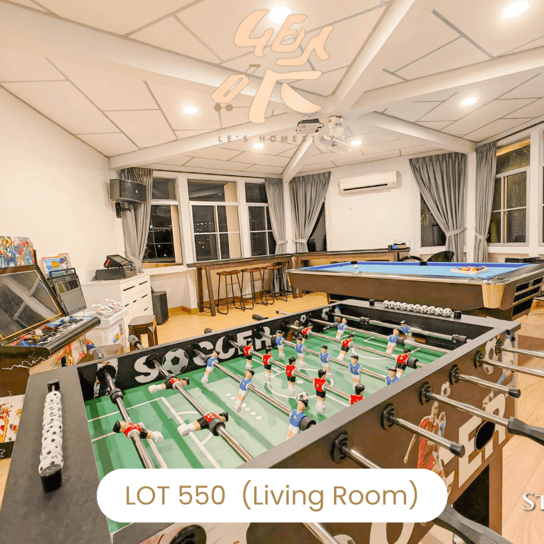 Game room featuring foosball and arcade machines at Le's Homestay Lot 550, a family Homestay Melaka Private Pool.