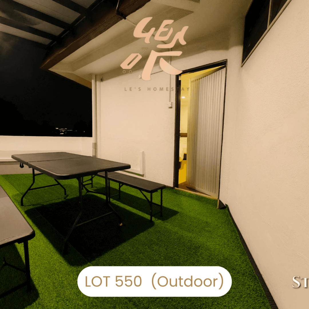 Private balcony seating area at night at Le's Homestay Lot 550, a comfortable Homestay Melaka Private Pool accommodation.