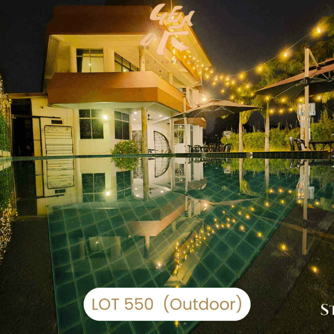 Poolside gathering area with dining table at Le's Homestay Lot 550, a family friendly Homestay Melaka Private Pool.