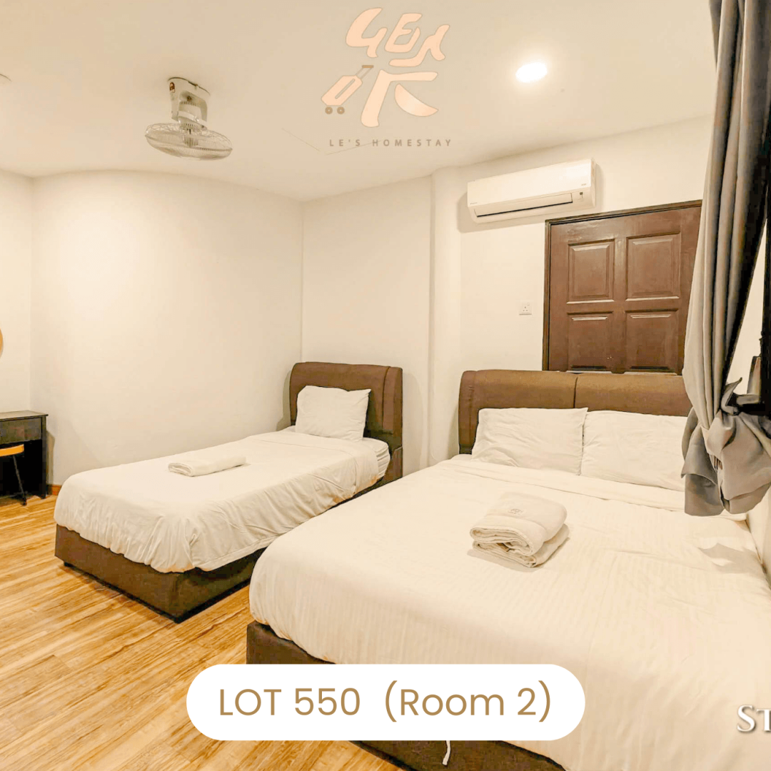 Comfortable bedroom setup with multiple beds at Le's Homestay Lot 550, a family-friendly Homestay Melaka Private Pool.