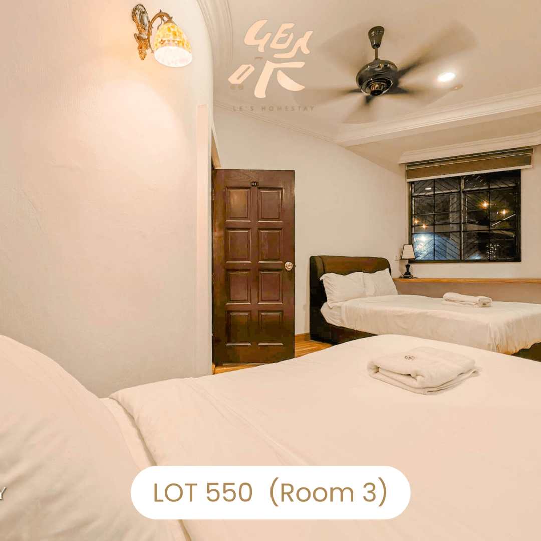 Family bedroom setup with two queen beds at Le's Homestay Lot 550, a spacious Homestay Melaka Private Pool villa (Room 3).