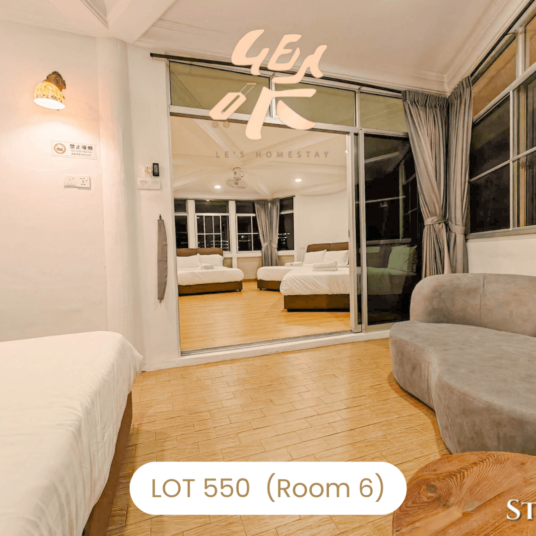 Private seating area with sofa inside spacious Room 6 at Le's Homestay Lot 550, a comfortable Homestay Melaka Private Pool unit.