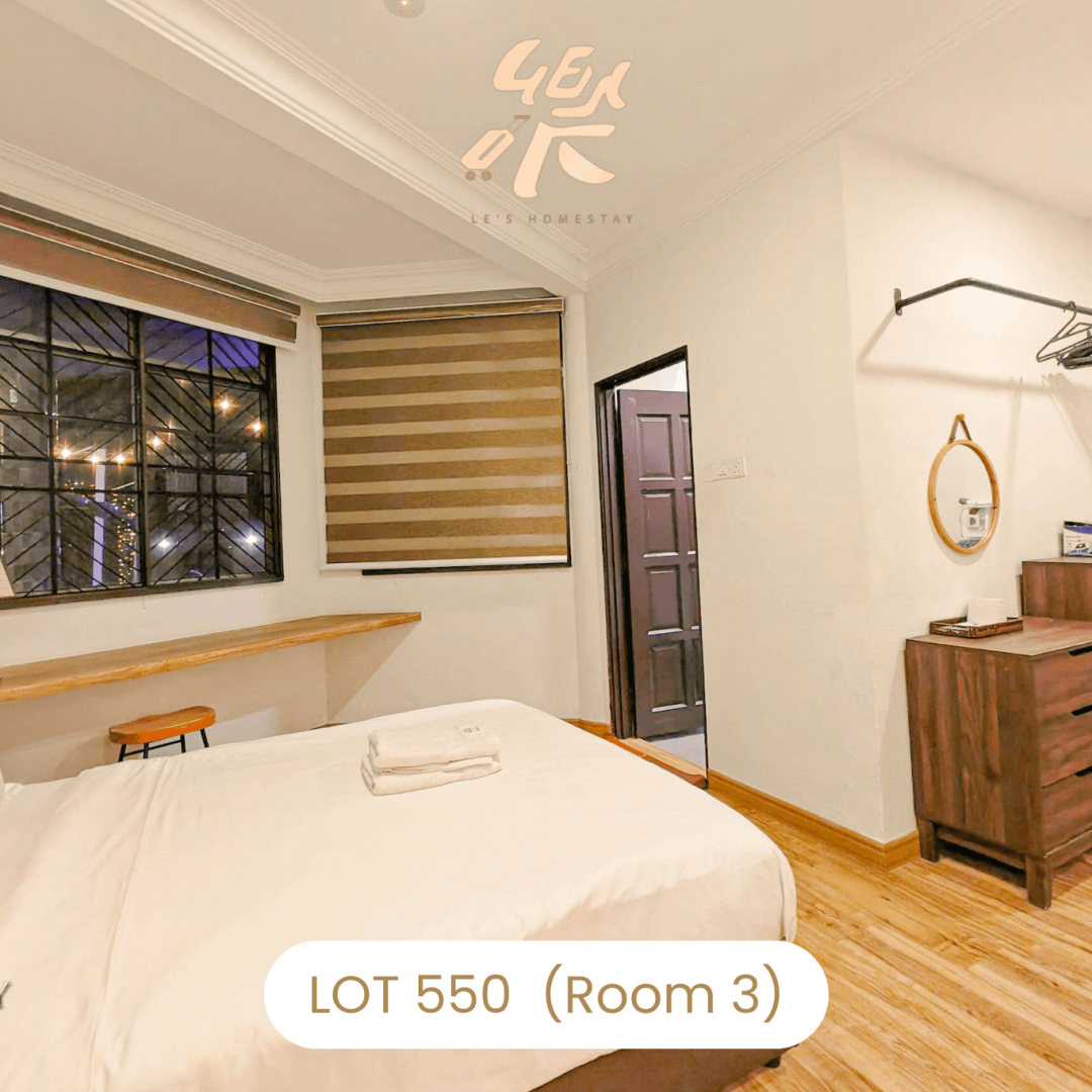 Cozy bedroom corner with window blinds and dressing table at Le's Homestay Lot 550, a furnished Homestay Melaka Private Pool room (Room 3).
