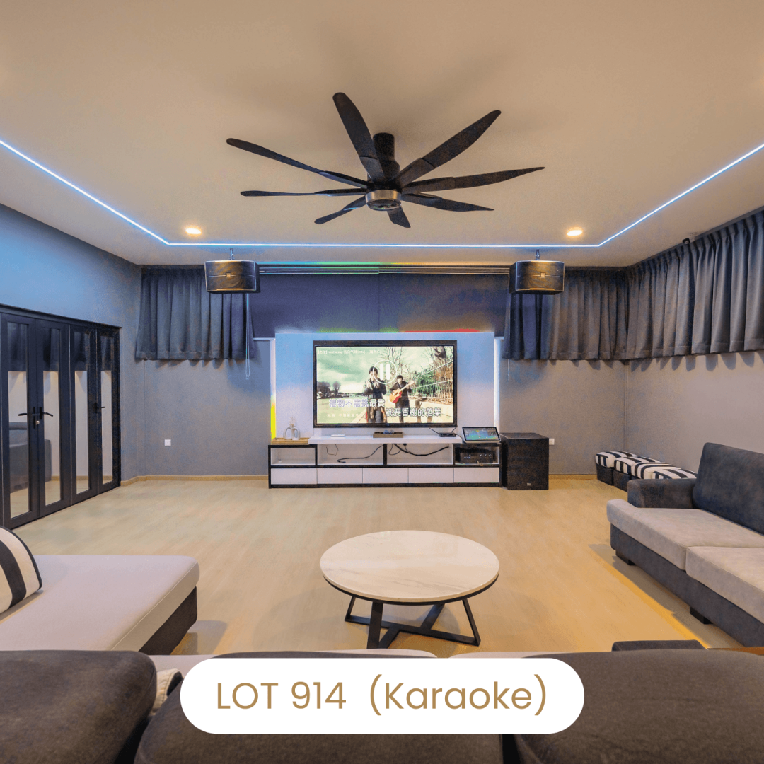 Spacious living room with large TV and karaoke system at Le's Homestay Lot 914