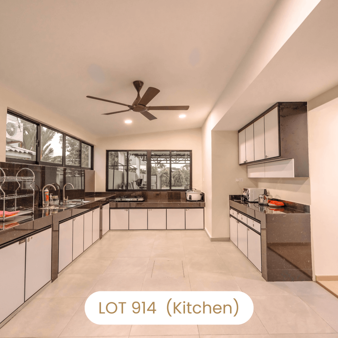 Fully equipped kitchen counter with sink and stove facilities at Le's Homestay Lot 914