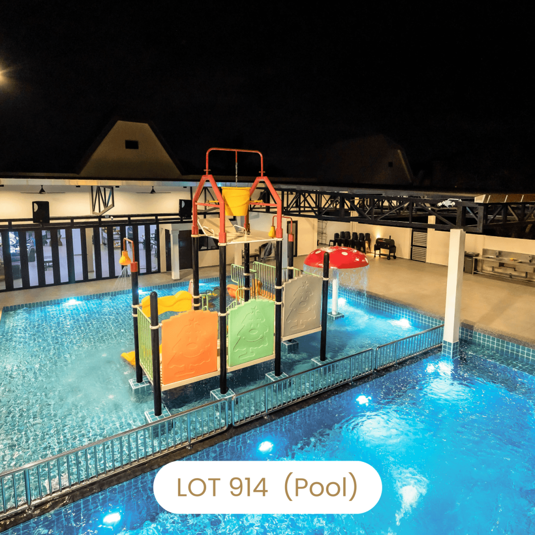 Night view of private swimming pool with water playground at Le's Homestay Lot 914