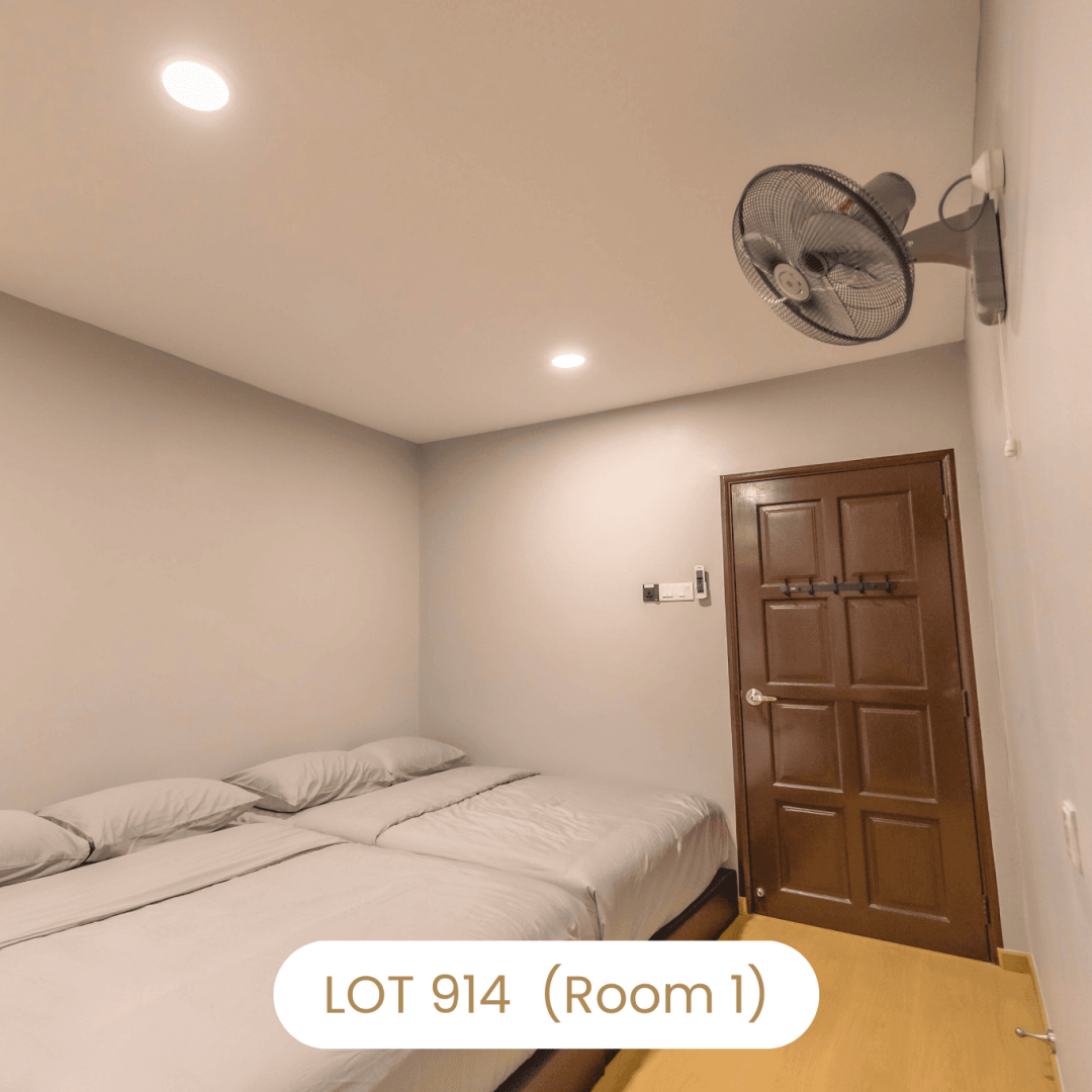 Clean air conditioned bedroom interior at Le's Homestay Lot 914 A'Famosa Homestay