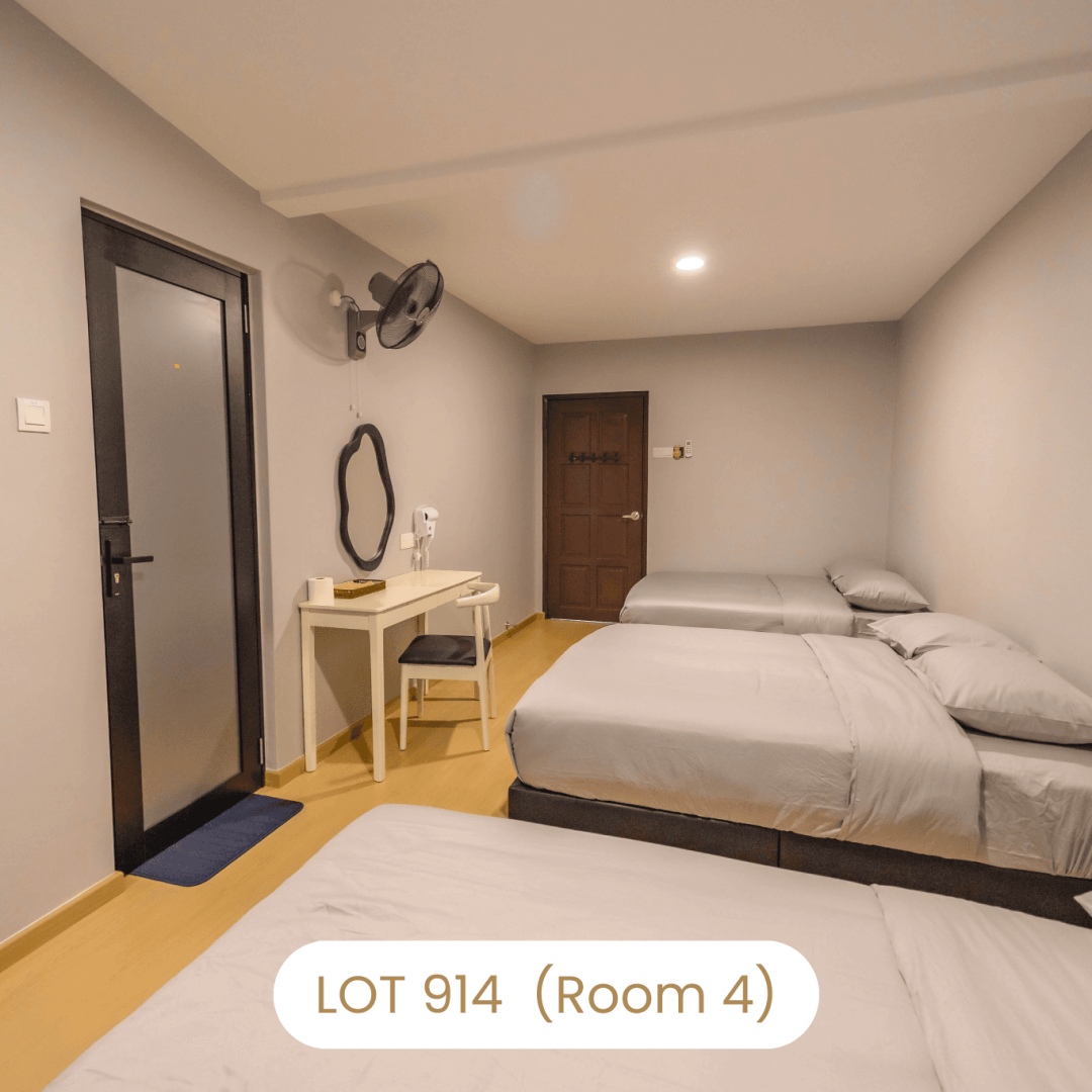 Bedroom dressing table and door view in Room 4 at Le's Homestay Lot 914