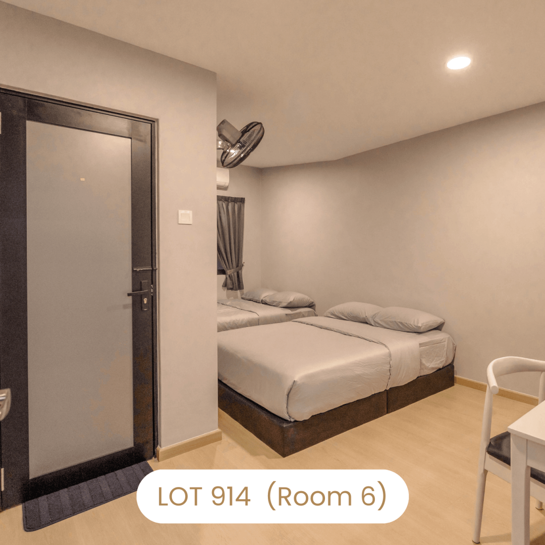 Bedroom entrance view showing queen beds layout at Le's Homestay Lot 914 A'Famosa Homestay (Room 6)