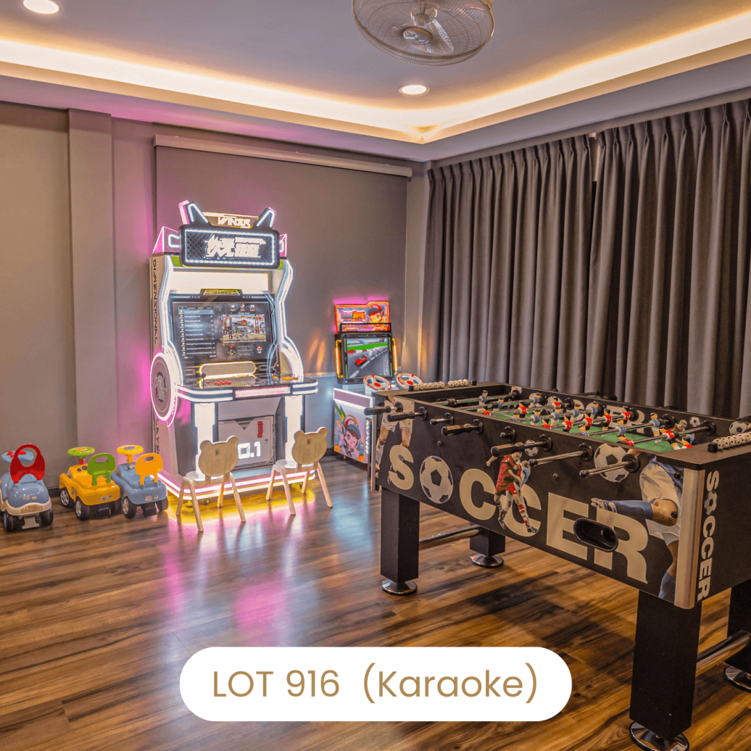 Entertainment zone featuring arcade games and foosball table at Le's Homestay Lot 916 A'Famosa Homestay