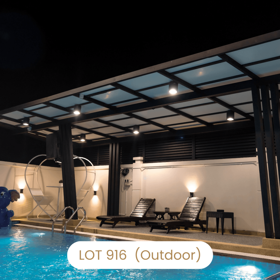 Night view of covered outdoor patio and pool area at Le's Homestay Lot 916 A'Famosa