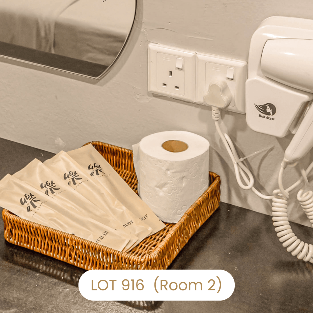 Complimentary Le's Homestay branded toiletries and dental kit amenities at Lot 916