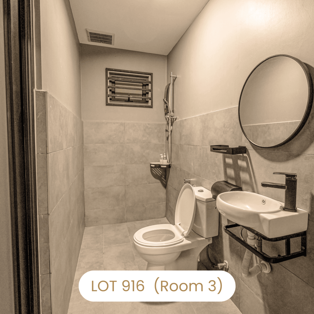 Clean private bathroom facility with sink and toilet at Le's Homestay Lot 916